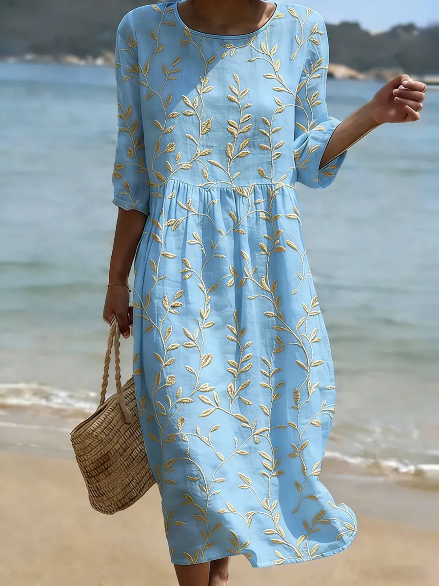 Robe bleue brodée de fleurs vintage