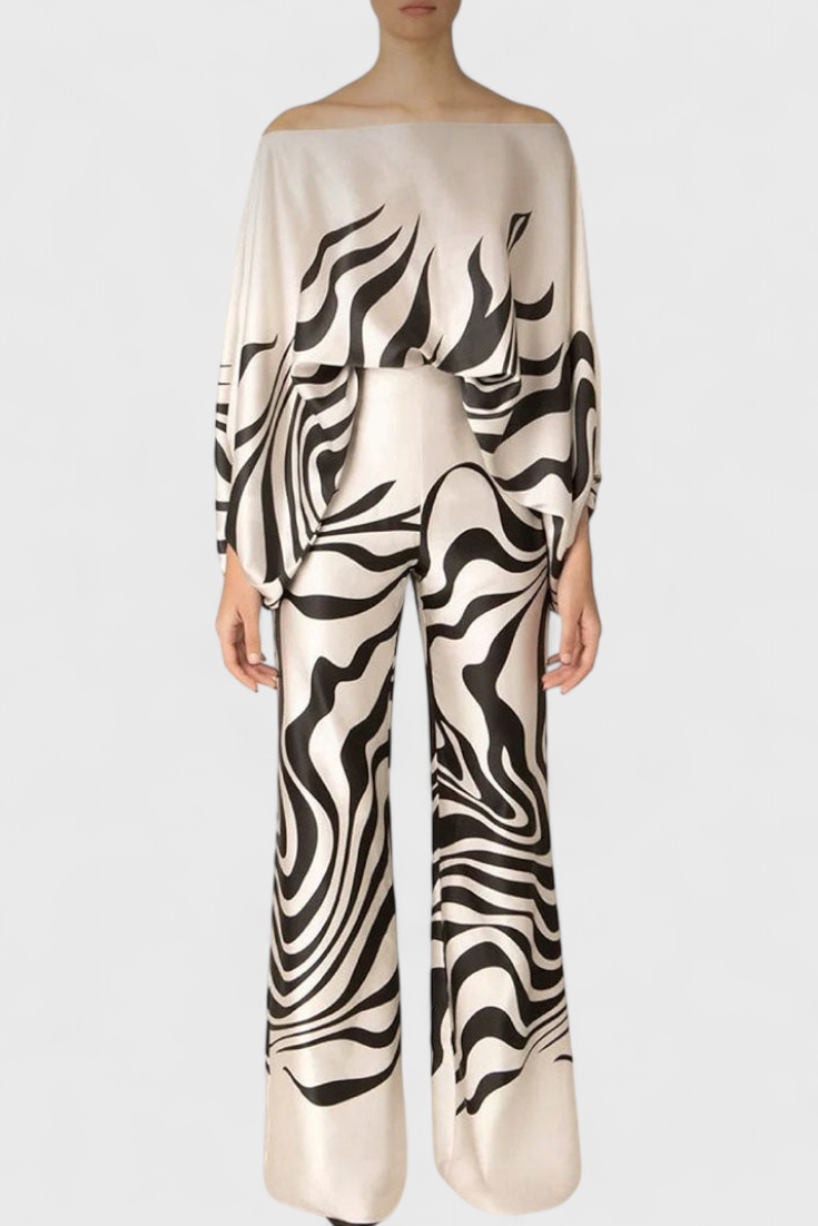 Ensemble deux pièces Sybella avec épaules dénudées et pantalon large imprimé