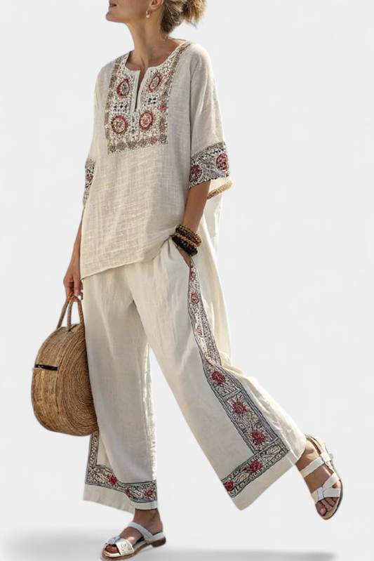 Naomi™ | Top décolleté stylé avec un pantalon large à rayures.